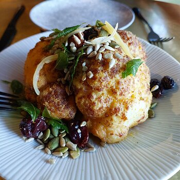 Fried cauliflower, vadouvan oil, tea-soaked mulberries, garlic toum