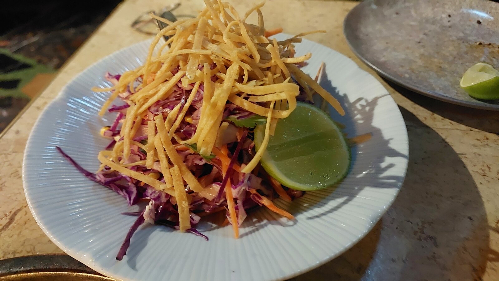 BRAZILIAN COLESLAW lime dressing, charred corn, cabbage, crisp tortilla