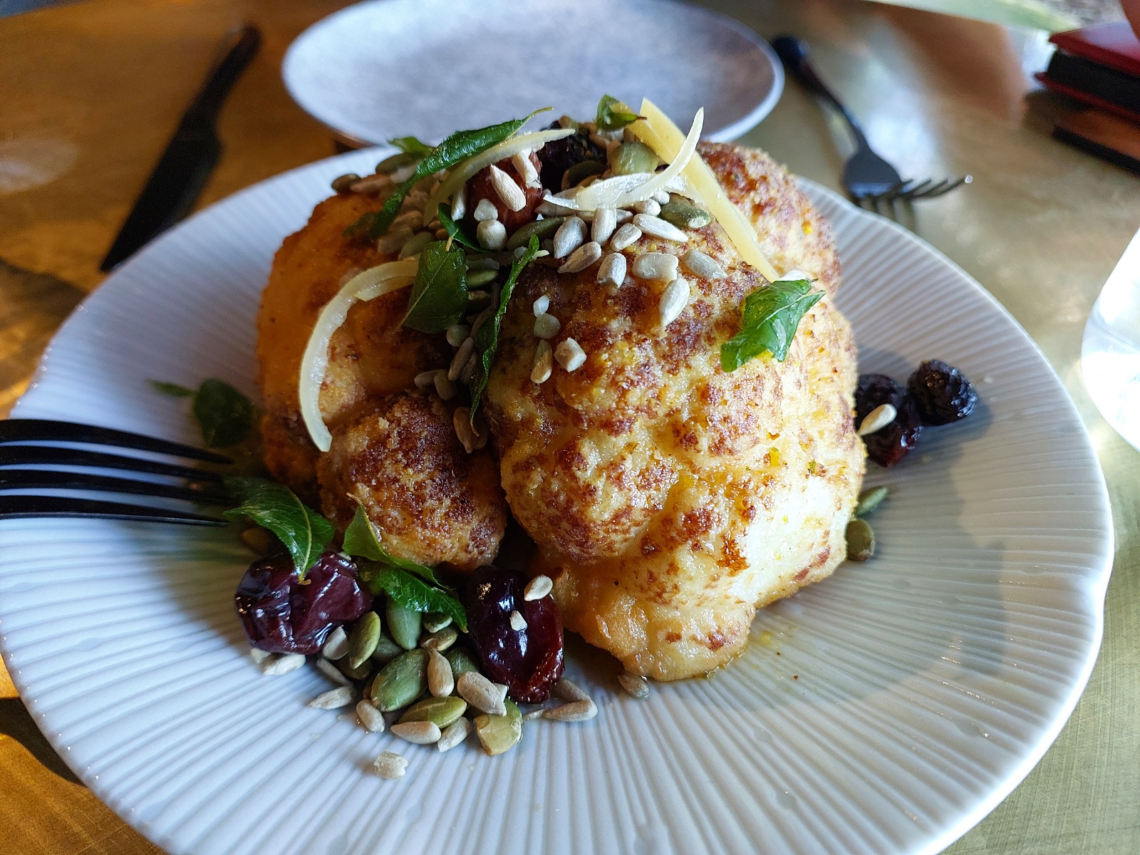 Fried cauliflower, vadouvan oil, tea-soaked mulberries, garlic toum